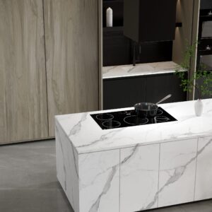 Modern kitchen island with marble countertop and built-in stovetop.